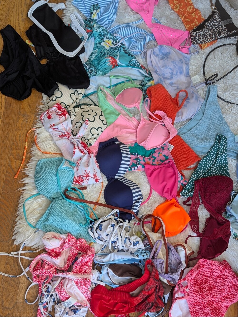 Mixed Lot of Women's Bikinis and Swimwear Tops in Various Colors and Styles